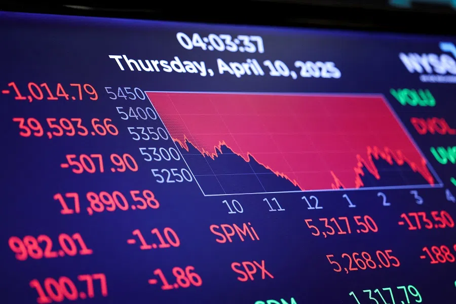 A screen shows trading indexes at the New York Stock Exchange (NYSE) in New York City, US, 10 April 2025. (Jeenah Moon/Reuters)