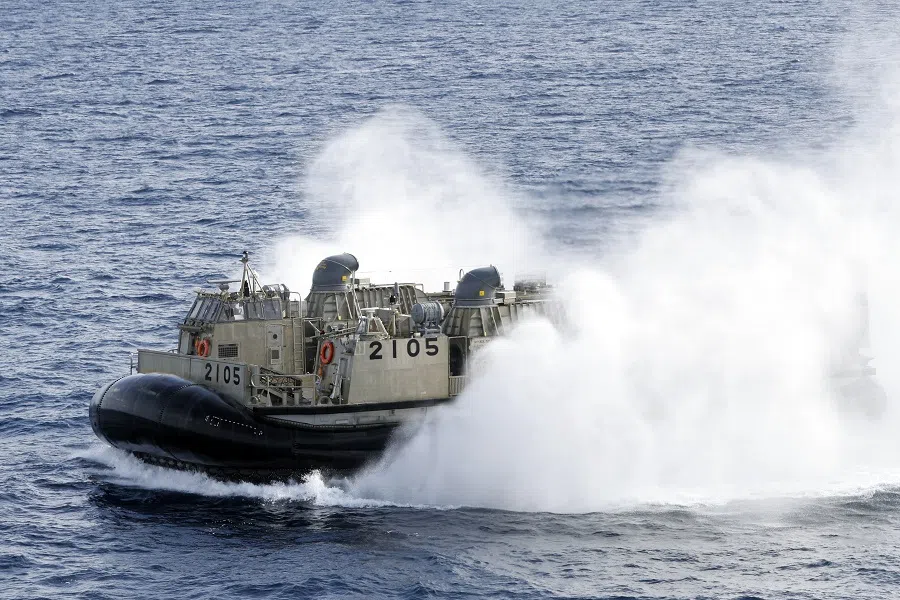 A Japan Maritime Self-Defense Force (JMSDF) Landing Craft Air Cushion (LCAC) departs from the JMSDF JS Kunisaki tank landing ship during a joint exercise by Japan Self-Defense Forces (JSDF) off the coast of Tanegashima island in Kagoshima, Japan, on 25 November 2021. (Kiyoshi Ota/Bloomberg)