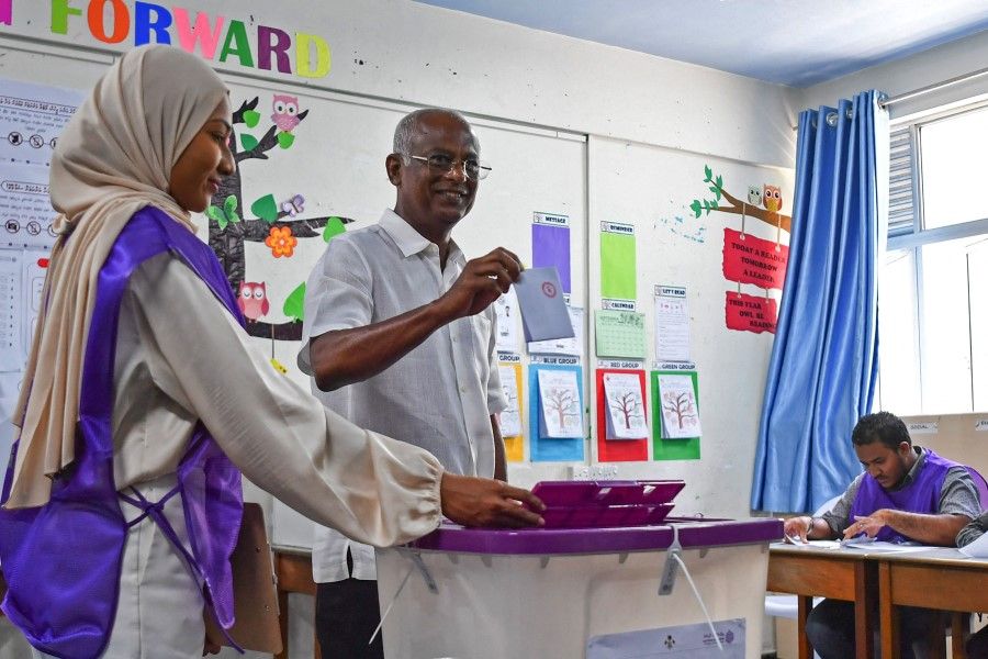 Incumbent Maldives President Ibrahim Mohamed Solih casts his ballot during the presidential election in Male on 9 September 2023. (Mohamed Afrah/AFP)