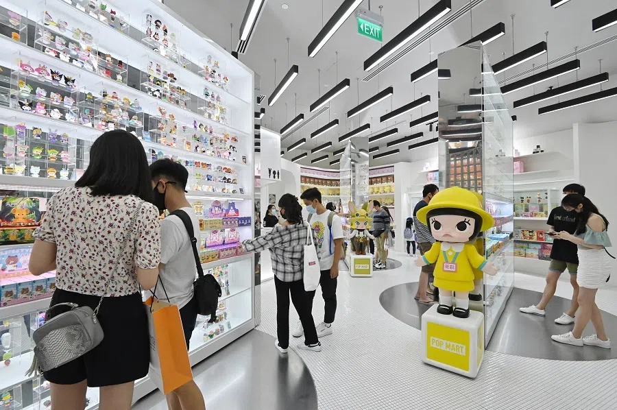 Customers browsing the products at the Pop Mart store located in Funan Shopping Centre, Singapore. (SPH Media)