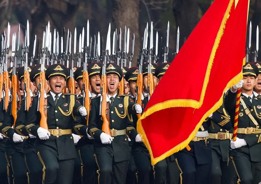 Chinese People's Liberation Army (PLA) honour guard members march during a welcoming ceremony at the Great Hall of the People in Beijing, China, on 12 November 2025. (Maxim Shemetov/Pool/Reuters)