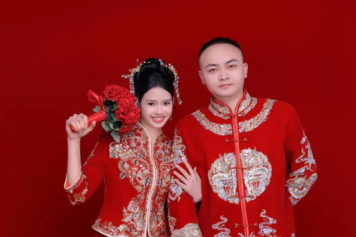 Lu Zhenliang from Fujian, China with his wife, Indonesian Tasha Sakinah.