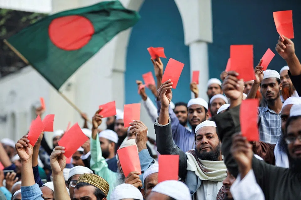 Supporters of Islami Andolan Bangladesh party attend a protest rally demanding to abolish what they call a "dummy election" and to reorganise a free and fair election under the caretaker government, in Dhaka, Bangladesh, on 9 January 2024. (Mohammad Ponir Hossain/Reuters)