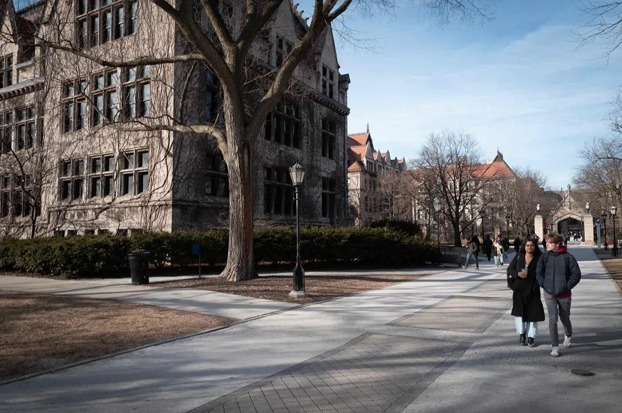 People walk on the campus of the University of Chicago on 10 February 2025 in Chicago, Illinois, US. (Scott Olson/Getty Images/AFP)