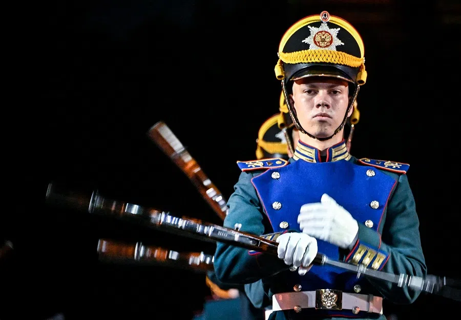 Russian soldiers perform with weapons at the Red Square during the Spasskaya Tower International Military Music Festival at the Red Square in Moscow, Russia, on 26 August 2022. (Alexander Nemenov/AFP)
