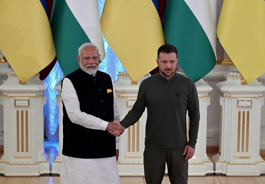 Ukrainian President Volodymyr Zelenskyy (R) and Indian Prime Minister Narendra Modi shake hands prior to their talks at the Mariinskyi Palace on 23 August 2024, amid the Russian invasion of Ukraine. (Sergei Supinsky/AFP)