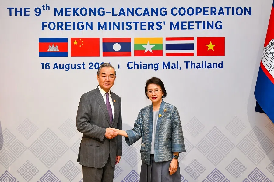 Thailand’s Foreign Affairs Permanent Secretary Eksiri Pintaruchi greets China’s Foreign Minister Wang Yi during the 2024 Mekong-Lancang Cooperation foreign ministers’ meeting in Chiang Mai. (Thailand’s Ministry of Foreign Affairs/AFP)