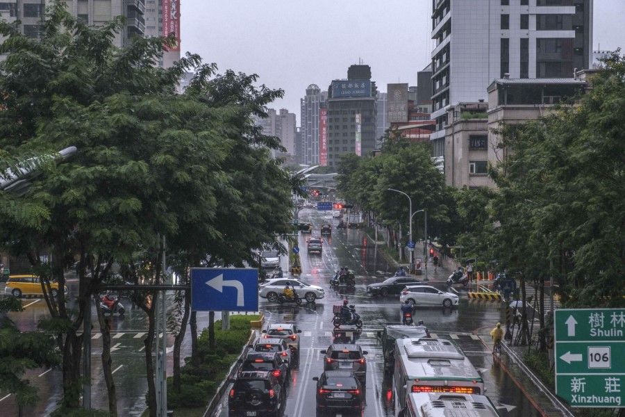 Vehicles travel along a road in Taipei, Taiwan, on 2 August 2022. (Lam Yik Fei/Bloomberg)