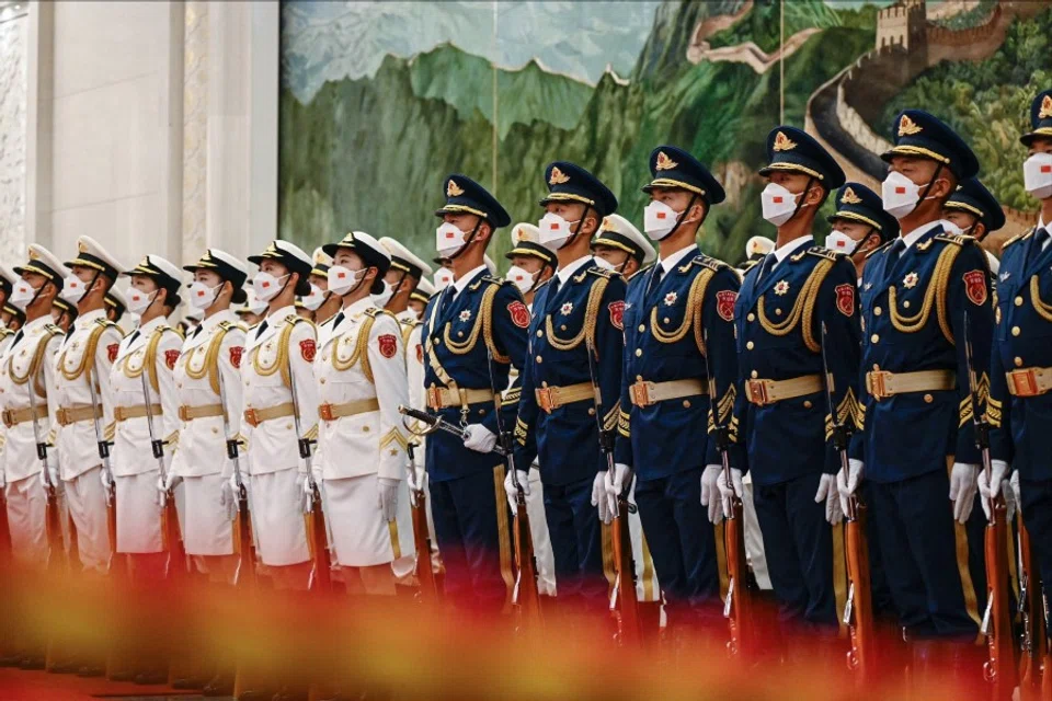 Chinese honour guards prepare for the arrival of China's Premier Li Qiang and Mongolia's Prime Minister Luvsannamsrain Oyun-Erdene ahead of a welcoming ceremony at the Great Hall of the People in Beijing on 28 June 2023. (Jade Gao/AFP)