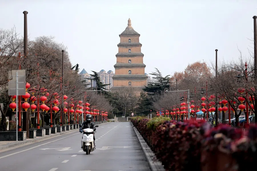 A rider travels on an empty road following lockdown measures to curb the spread of the coronavirus disease (Covid-19) in Xian, Shaanxi province, China, 26 December 2021. (CNS photo via Reuters)