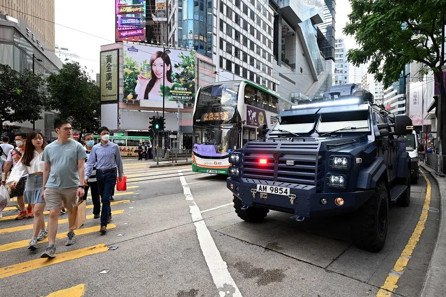 A police armoured vehicle is seen parked in the Causeway Bay shopping district of Hong Kong, China, on 4 June 2023, close to the venue where Hong Kong people traditionally gather annually to mourn the victims of China's Tiananmen Square crackdown in 1989, which the authorities have banned and vowed to stamp out any protests on the anniversary on 4 June. (Peter Parks/AFP)