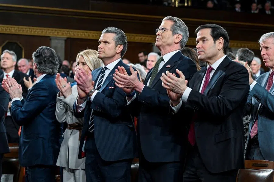 Attorney General Pam Bondi, Secretary of Defense Pete Hegseth, Secretary of the Treasury Scott Bessent and Secretary of State Marco Rubio applaud as US President Donald J. Trump delivers the first State of the Union address of his second term to a joint session of Congress in the House Chamber of the United States Capitol in Washington, DC, on 24 February 2026. (Kenny Holston/Reuters)