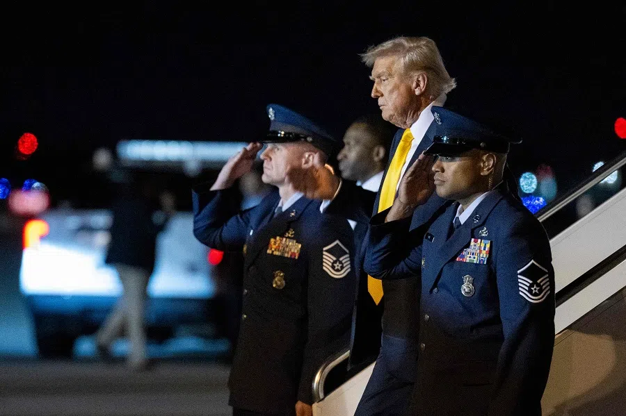 US President Donald Trump steps off Air Force One at Palm Beach International Airport in West Palm Beach, Florida, on 7 March 2025. (Roberto Schmidt/AFP)