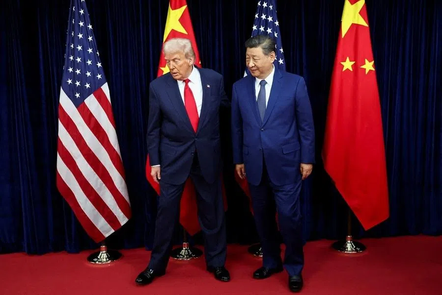 US President Donald Trump and Chinese President Xi Jinping walk, as they hold a bilateral meeting at Gimhae International Airport on the sidelines of the Asia-Pacific Economic Cooperation (APEC) summit in Busan, South Korea, on 30 October 2025. (Evelyn Hockstein/Reuters)