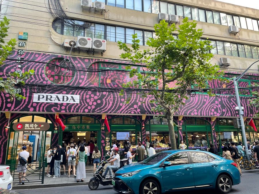 The facade the Wuzhong Market wrapped in extra-large Prada logos and motifs. (Photo: Chen Jing)