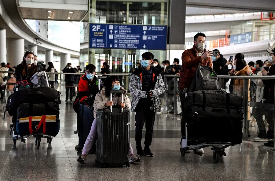 Passengers are seen in the arrivals area for international flights at the Capital International Airport in Beijing, China, on 8 January 2023. (Noel Celis/AFP)