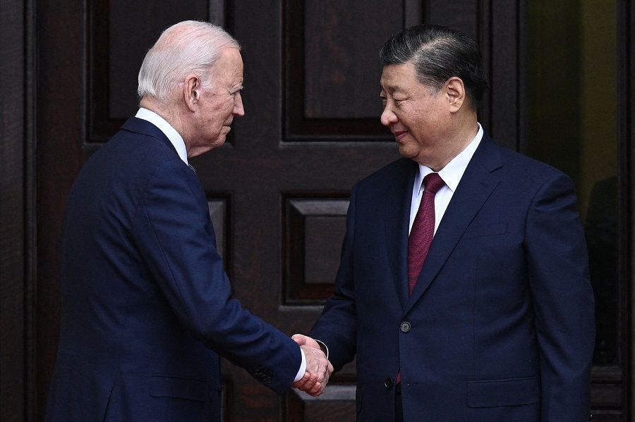 US President Joe Biden greets Chinese President Xi Jinping before a meeting during the Asia-Pacific Economic Cooperation (APEC) Leaders' week in Woodside, California, on 15 November 2023. (Brendan Smialowski/AFP)