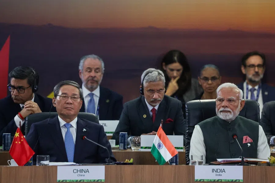 China’s Premier Li Qiang and India’s Prime Minister Narendra Modi attend a meeting during the BRICS Summit in Rio de Janeiro, Brazil, on 7 July 2025. (Ricardo Moraes/Reuters)