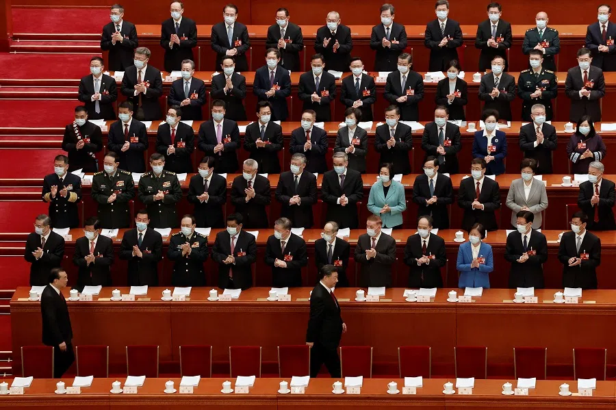 Chinese President Xi Jinping and Premier Li Keqiang arrive for the opening session of the National People's Congress (NPC) at the Great Hall of the People in Beijing, China, on 5 March 2023. (Thomas Peter/Reuters)