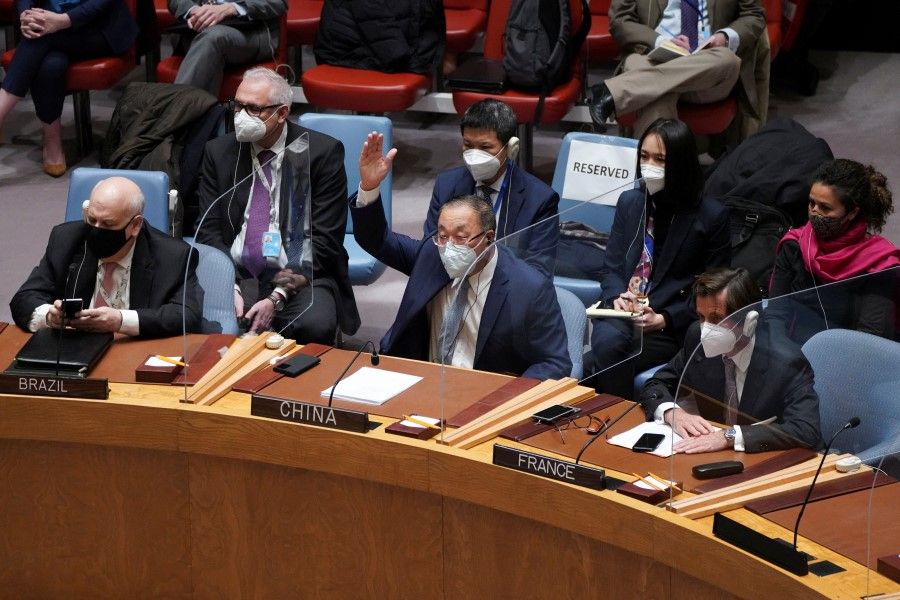 China's ambassador to the UN Zhang Jun gestures as the United Nations Security Council assembles to vote for a rare emergency special session of the 193-member UN General Assembly on Russia's invasion of Ukraine, at the United Nations Headquarters in Manhattan, New York City, US, 27 February 2022. (David 'Dee' Delgado/Reuters)