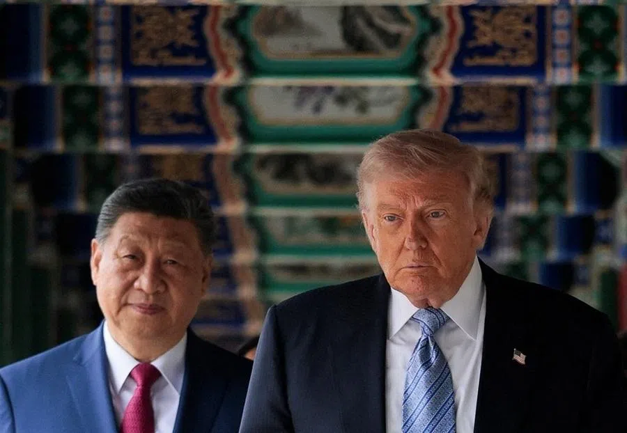 US President Donald Trump participates in a friendship walk through Zhongnanhai Garden with Chinese President Xi Jinping in Beijing, China, on 15 May 2026.