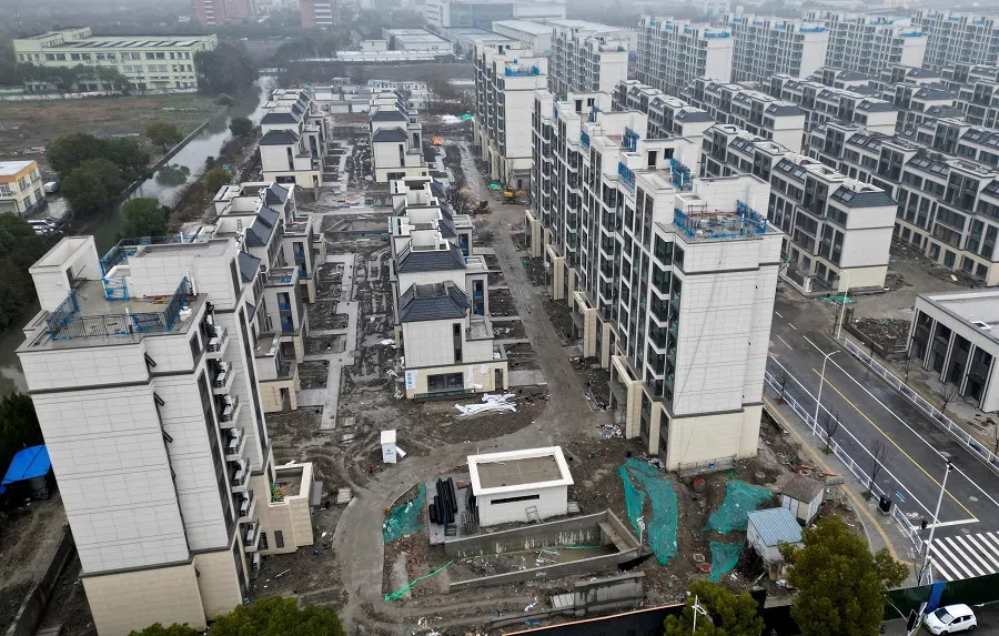 A drone view of an under-construction residential development in Shanghai, China, 29 February 2024. (Xihao Jiang/Reuters)