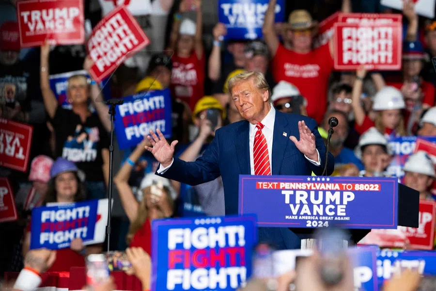 Former US President and Republican presidential candidate Donald Trump gestures as he speaks during a rally at 1st Summit Arena at the Cambria County War Memorial in Johnstown, Pennsylvania, US, on 30 August 2024. (Roberto Schmidt/AFP)