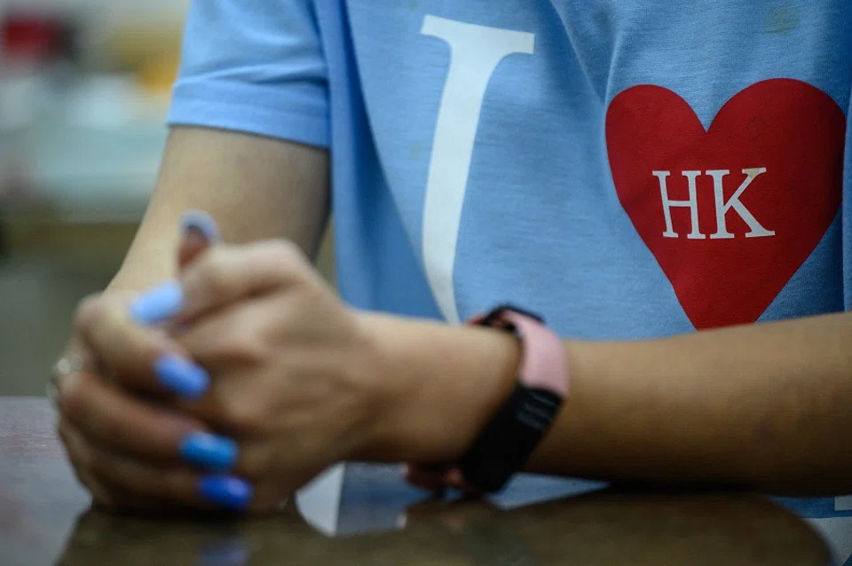 Wearing their hearts on their sleeves ( Philip Fong / AFP)