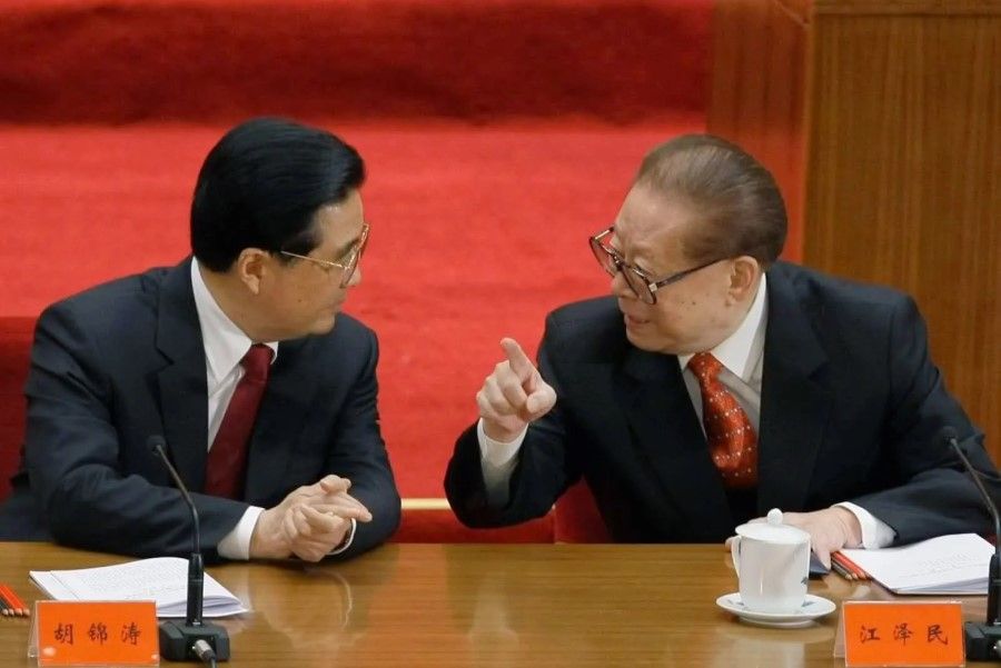 Hu Jintao (left) with Jiang Zemin, undated. (Internet)