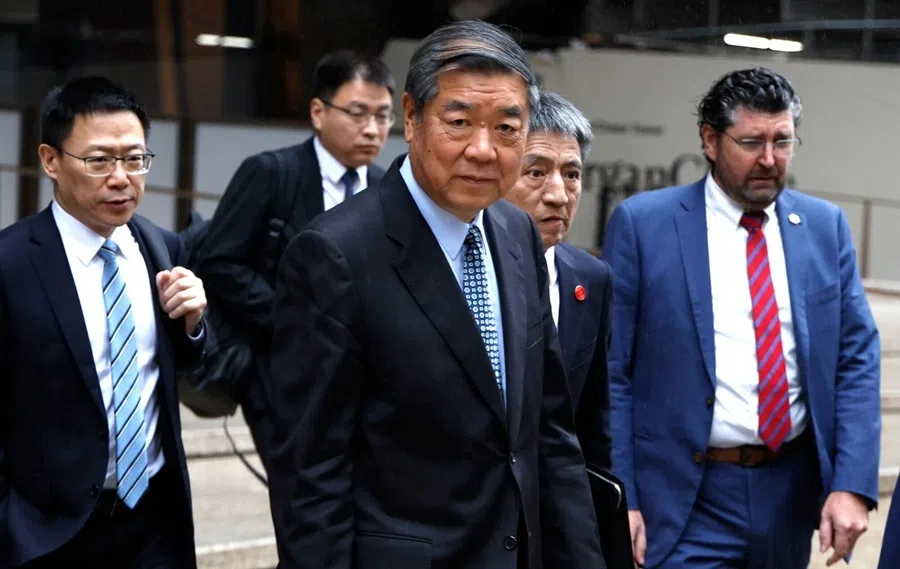 He Lifeng, China's vice premier (centre), is seen leaving the JPMorgan Chase & Co. global headquarters in New York, US, on 20 September 2026.