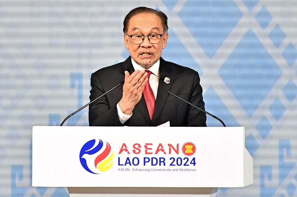 Malaysia’s Prime Minister Anwar Ibrahim speaks at the end of the 44th and 45th Association of Southeast Asian Nations (ASEAN) summits, with Malaysia set to take over the ASEAN chairmanship in 2025, in Vientiane on 11 October 2024. (Tang Chhin Sothy/AFP)