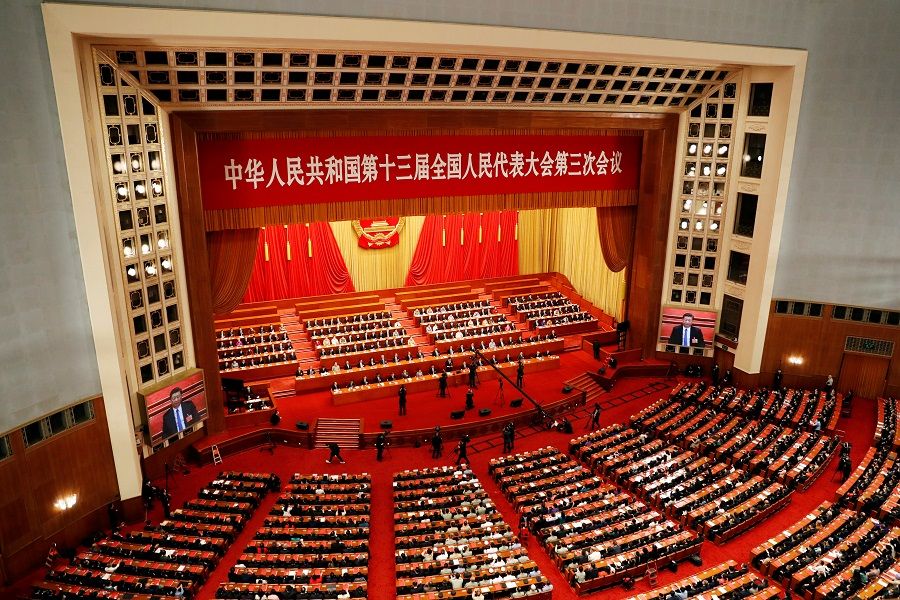 Chinese officials and delegates attend the closing session of the National People's Congress (NPC) at the Great Hall of the People in Beijing, China, 28 May 2020. (Carlos Garcia Rawlins/File Photo/Reuters)