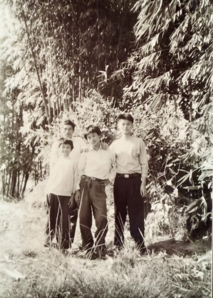 Wesley Shen (right) with his two brothers and father. (Photo provided by interviewee)