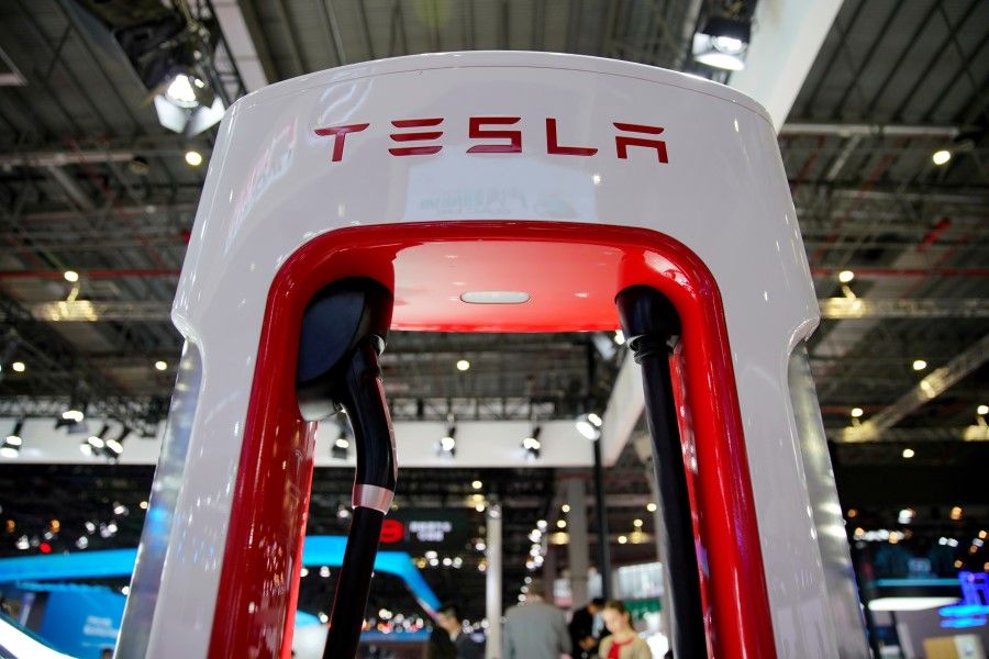 A Tesla charging station is pictured during the media day for the Shanghai auto show in Shanghai, China, 16 April 2019. (Aly Song/Reuters)