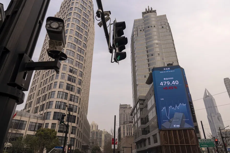A public screen displaying stock figures in Shanghai, China, on 29 January 2024. (Raul Ariano/Bloomberg)