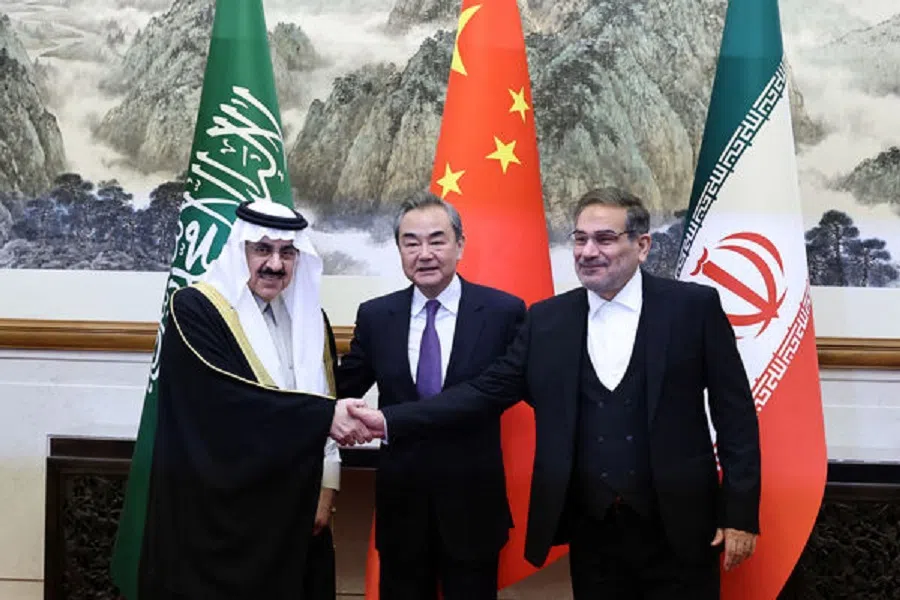 Wang Yi, a member of the Political Bureau of the Communist Party of China (CPC) Central Committee and director of the Office of the Central Foreign Affairs Commission, Ali Shamkhani, the secretary of Iran’s Supreme National Security Council, and Minister of State and national security adviser of Saudi Arabia Musaad bin Mohammed Al Aiban pose for pictures during a meeting in Beijing, China, on 10 March 2023.