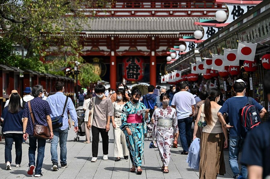 People visit Sensoji temple in Tokyo's Asakusa district on 22 September 2020. (Charly Triballeau/AFP)