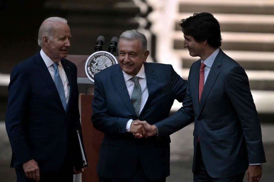 Canadian Prime Minister Justin Trudeau (right), Mexican President Andres Manuel Lopez Obrador (centre) and US President Joe Biden (left) after speaking to the press at the end of the 10th North American Leaders' Summit at the National Palace in Mexico City, on 10 January 2023. (Nicolas Asfouri/AFP)