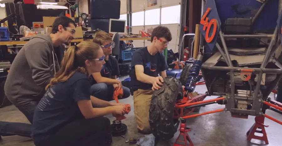 Students work on a project at Olin College of Engineering. (Screen grab from video)