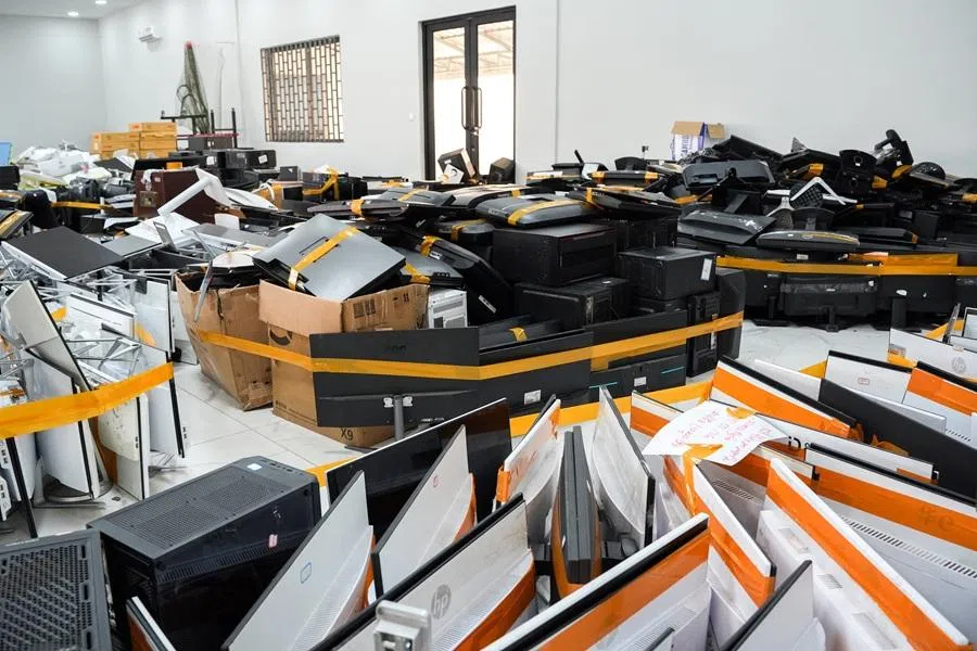 Computer monitors and other equipment seized during an online scam crackdown at the Phnom Penh Municipal Police Commissariat in Phnom Penh, Cambodia, 11 March 2026. (Roun Ry/Reuters)