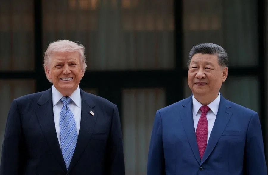 US President Donald Trump poses for a picture with Chinese President Xi Jinping during a visit to the Zhongnanhai Garden in Beijing, China, on 15 May 2026.