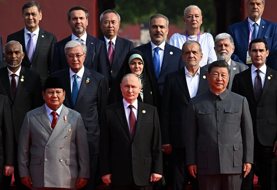 Indonesian President Prabowo Subianto, Russian President Vladimir Putin, Chinese President Xi Jinping and heads of foreign delegations pose for a family photo before a military parade marking the 80th anniversary of the end of World War Two, in Beijing, China, on 3 September 2025. (Sputnik/Sergey Bobylev/Pool via Reuters)