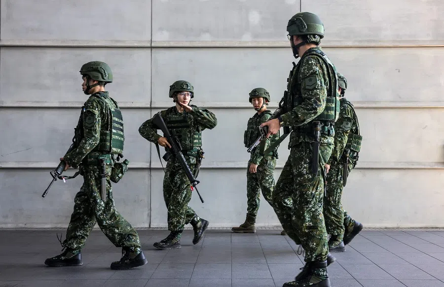 Reservists taking part in an urban combat training exercise at the Taipei Tennis Center in Taipei’s Neihu district on 11 June 2025. (I-Hwa Cheng/AFP)