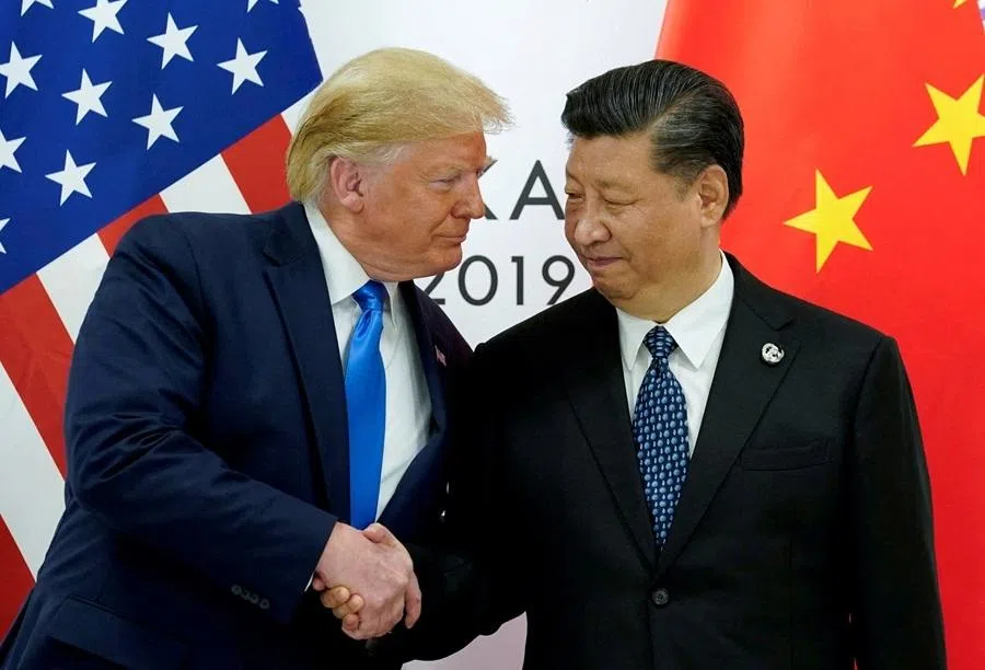 US President Donald Trump meets with Chinese President Xi Jinping at the start of their bilateral meeting at the G20 leaders summit in Osaka, Japan, on 29 June 2019. (Kevin Lamarque/Reuters)