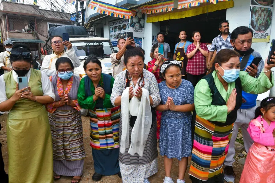 Tibetans participate in a procession to mark the 87th birthday of their spiritual leader, the Dalai Lama, at Jawalakhel Tibetan refugee camp in Lalitpur on the outskirts of Kathmandu on 6 July 2022. (Prakash Mathema/AFP)