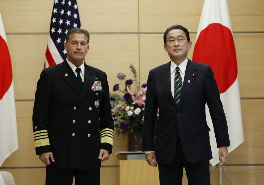 US Admiral John C. Aquilino (left), commander of the United States Indo-Pacific Command, meets with Japan's Prime Minister Fumio Kishida at the prime minister's official residence in Tokyo on 11 November 2021. (Issei Kato/AFP)