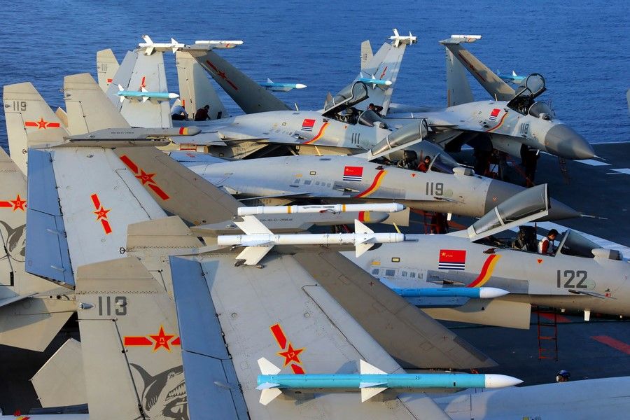 This undated file photo taken in April 2018 shows J-15 fighter jets on China's operational aircraft carrier, the Liaoning, during a drill at sea. (AFP)