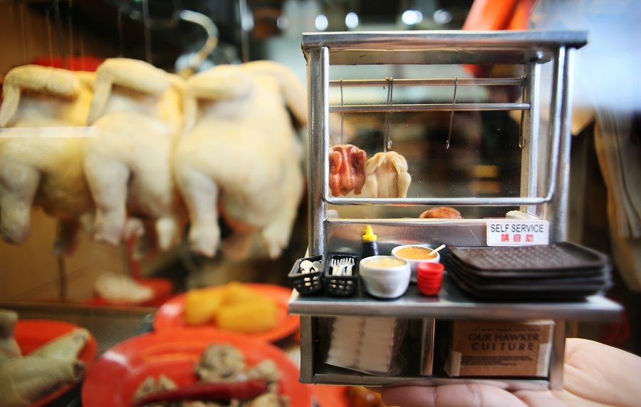 A miniature chicken rice stall photographed in Maxwell Food Centre in 2018. Singapore's hawker culture has been Inscribed in 2020 on the UNESCO's Representative List of the Intangible Cultural Heritage of Humanity. (SPH Media)