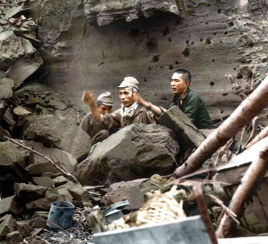 Japanese soldiers surrendering to US troops in Okinawa, April 1945. The Japanese put up a stubborn resistance and told civilians that if the Americans captured Okinawa, the locals would be slaughtered, leading to an especially fierce battle that lasted 96 days, with some 140,000 Japanese casualties. The Japanese battleship Yamato - claimed to be the largest in the world - was also sunk, with hundreds of planes lost that would have been flown by young kamikaze pilots. After Iwo Jima and Okinawa were lost, the land battle approached Japan's main islands, and despite the government's calls of ichioku gyokusai (一亿玉碎, literally 100 million shattered jewels, meaning willingness to sacrifice the entire Japanese population of 100 million), it was aware of impending failure.