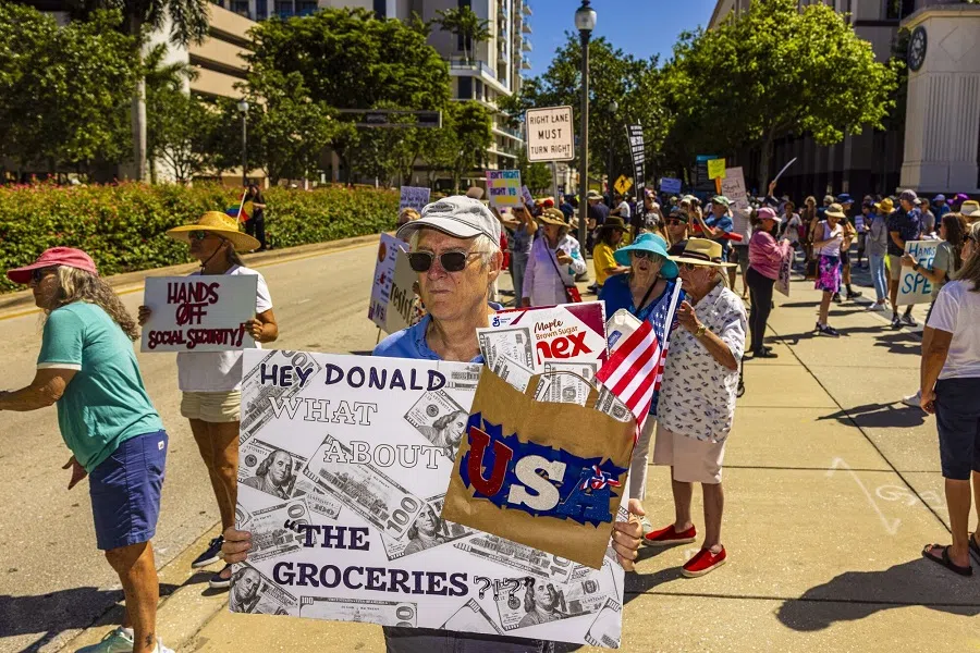 Demonstrators during a “Hands Off” protest against the Trump administration in West Palm Beach, Florida, US, on 5 April 2025.